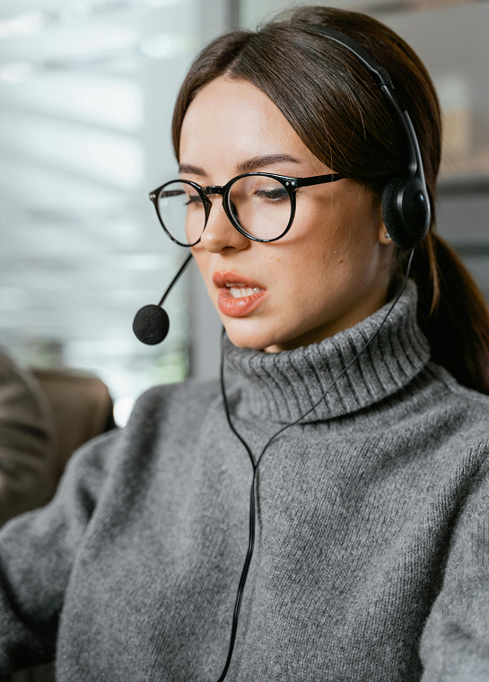 Support agent wearing a headset and glasses
