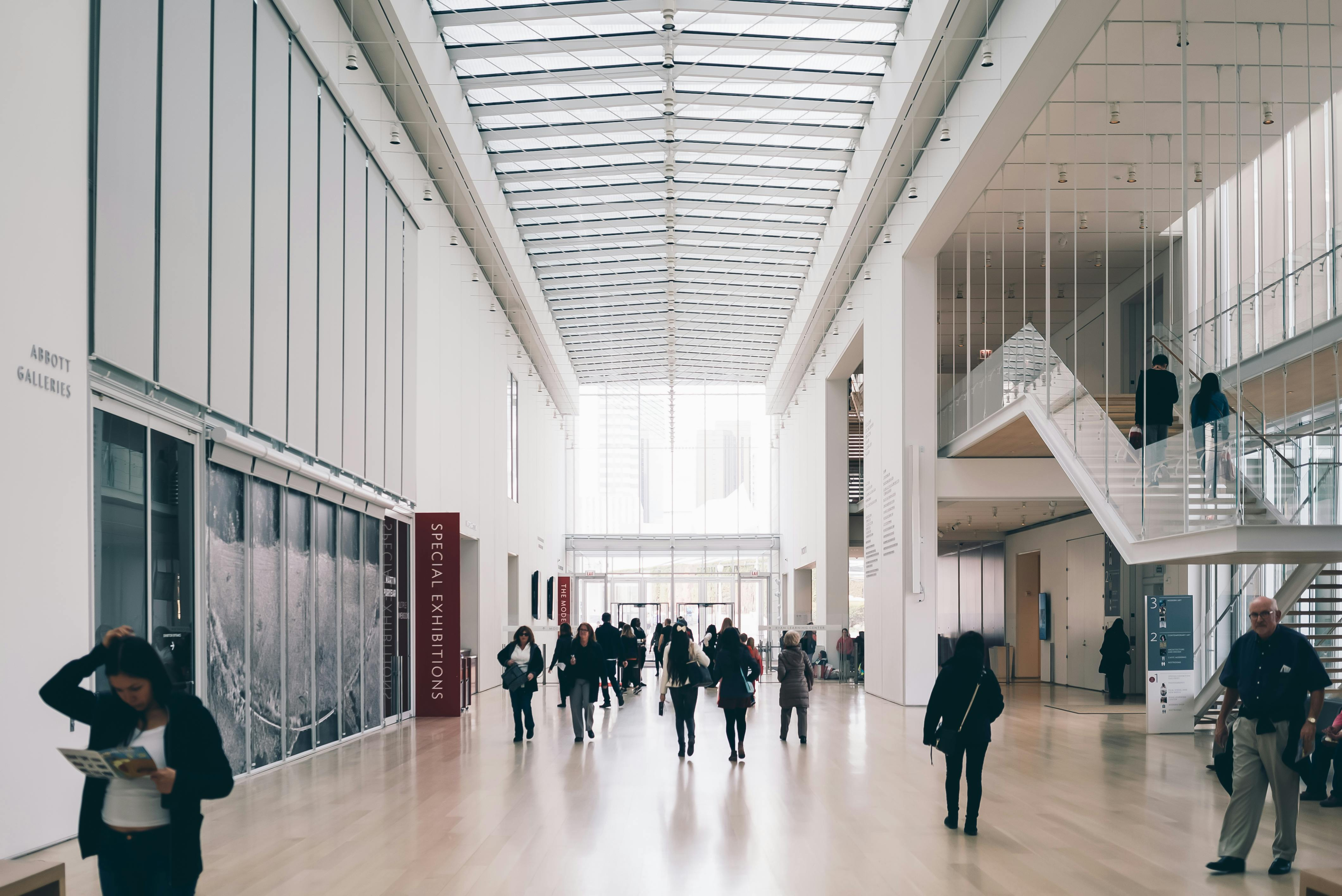 Modern building interior with people walking