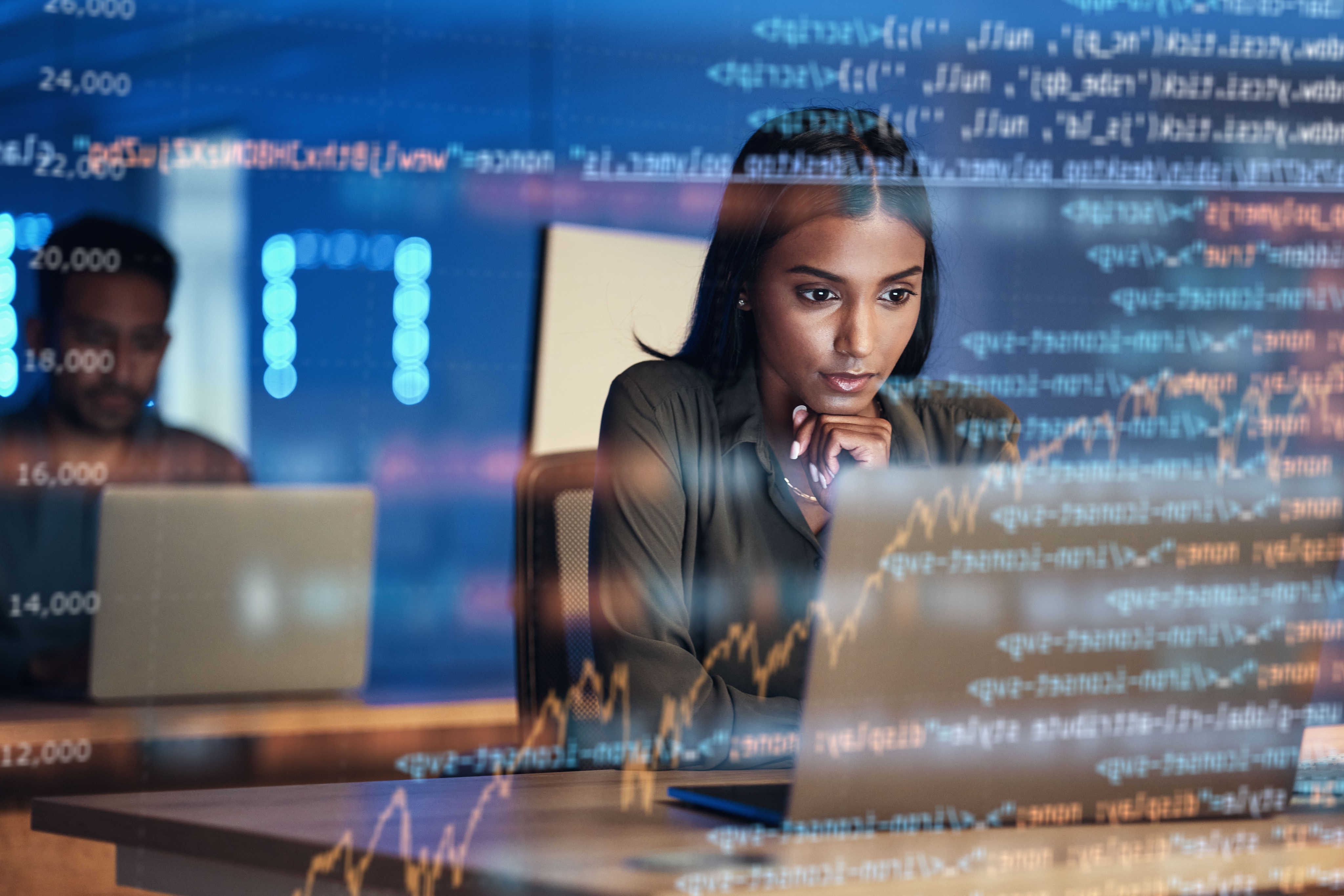 Woman developer coding on a laptop